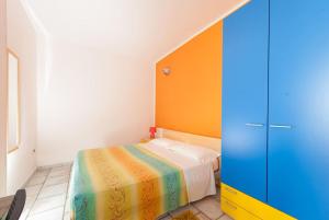Postel nebo postele na pokoji v ubytování Guest House Matteo