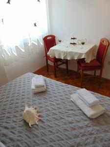Postel nebo postele na pokoji v ubytování Apartments Marija