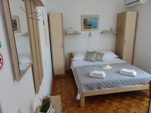 Postel nebo postele na pokoji v ubytování Apartments Marija