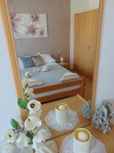 Postel nebo postele na pokoji v ubytování Apartments Marija