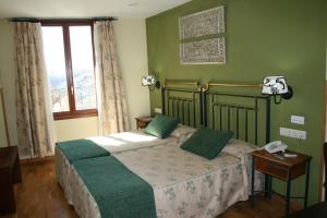 Posteľ alebo postele v izbe v ubytovaní Hotel Spa La Casa Mudéjar