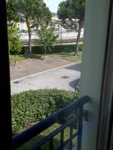a view of a street from a window at Appartamento Ai Tigli in Caorle