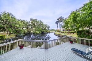 a deck with a view of a river at Saint Andrews Common 1774 in Hilton Head Island