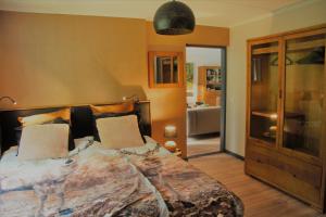 Llit o llits en una habitació de bosbungalow Ruighenrode