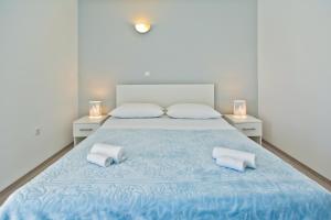 Cama ou camas em um quarto em Apartments Hvar