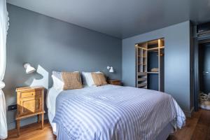 Giường trong phòng chung tại 902 Villa Luján +25 ảnh