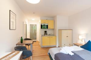 Η κουζίνα ή μικρή κουζίνα στο Inselquartett - Appartements inkl Wäschepaket - nähe AOK-Klinik
