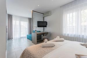 Postel nebo postele na pokoji v ubytování Pansion Casa