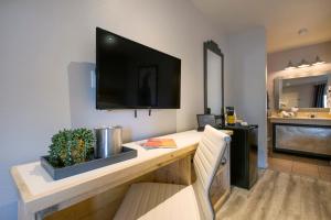 A kitchen or kitchenette at The Sage Hotel