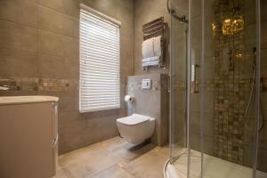 Koupelna v ubytování Signature Suites