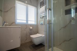 Koupelna v ubytování Signature Suites