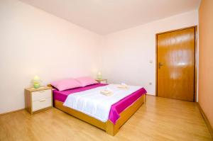 Postel nebo postele na pokoji v ubytování Apartment Barisa