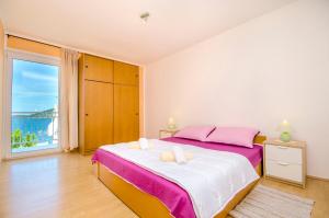 Postel nebo postele na pokoji v ubytování Apartment Barisa