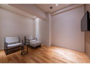 TV o dispositivi per l'intrattenimento presso the salon 伊豆高原 Hotels & Resort
