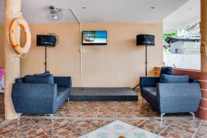TV a/nebo společenská místnost v ubytování Cawit Resort and Cafe
