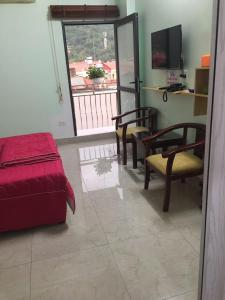 TV o dispositivi per l'intrattenimento presso Ruby Hostel Hà Giang
