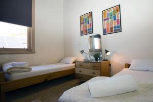 Postel nebo postele na pokoji v ubytování Delatite Hotel
