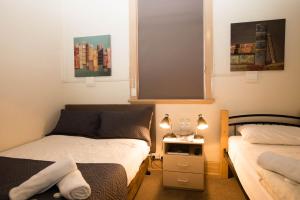 Postel nebo postele na pokoji v ubytování Delatite Hotel