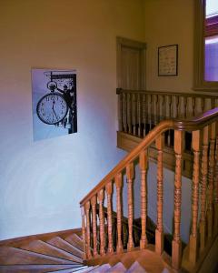 
a bike leaning against a wall next to a staircase at Delatite Hotel in Mansfield
