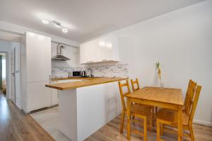 Kuchyň nebo kuchyňský kout v ubytování Apartment Kordiana + 4 fotografie