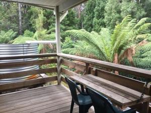 
A balcony or terrace at Corinna Wilderness Experience
