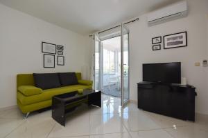 Posezení v ubytování Brunchi apartment Novalja