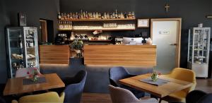 Lounge alebo bar v ubytovaní Penzion U Křížku