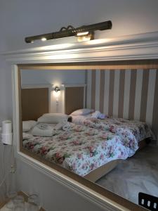 Cama o camas de una habitación en Hotel Avra