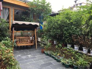 Garður fyrir utan Floral Hotel · Baihui Living Zhangjiajie