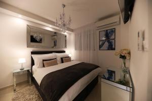 Posteľ alebo postele v izbe v ubytovaní KIKO Luxury Accommodation