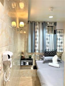 Ένα ή περισσότερα κρεβάτια σε δωμάτιο στο Super Guest House