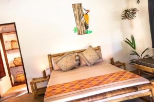 Three Little Birds Resort客房内的一张或多张床位