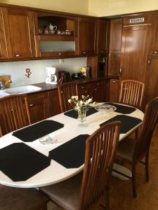 a kitchen table with a black and white table cloth at The Pirate's Mansion in Nafplio