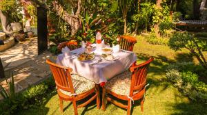Jardín al aire libre en Hotel Suma