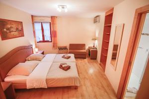 Postel nebo postele na pokoji v ubytování B&B Relais du Vigneron - Jean-Luc et Bruno Meyer
