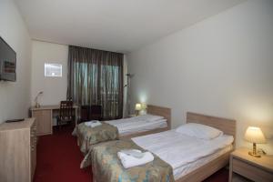 Кровать или кровати в номере Alazani Valley Hotel