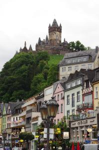a town with a castle on top of a hill at Ad Monte in Cochem +16 photos