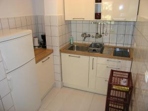 Kuchyňa alebo kuchynka v ubytovaní Apartments Sokolović + 37 fotografií