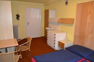 Posteľ alebo postele v izbe v ubytovaní Hostel Fortuna