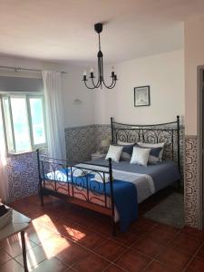 Postel nebo postele na pokoji v ubytování Casa Coloridos