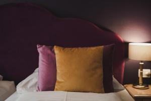 Postel nebo postele na pokoji v ubytování Hotel Adria