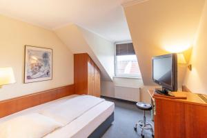TV o dispositivi per l'intrattenimento presso Hotel Markgraf Leipzig