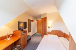 TV o dispositivi per l'intrattenimento presso Hotel Markgraf Leipzig