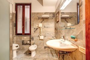 Koupelna v ubytování Hotel Gea Di Vulcano