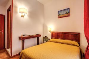Postel nebo postele na pokoji v ubytování Hotel Gea Di Vulcano