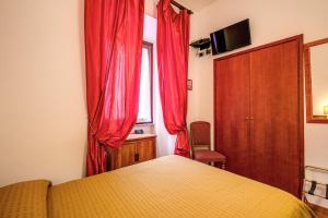 TV a/nebo společenská místnost v ubytování Hotel Gea Di Vulcano