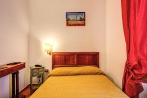 Postel nebo postele na pokoji v ubytování Hotel Gea Di Vulcano