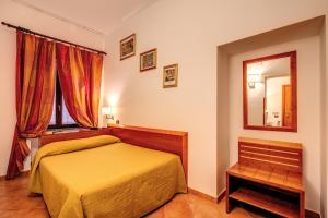 Postel nebo postele na pokoji v ubytování Hotel Gea Di Vulcano