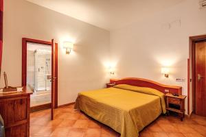 Postel nebo postele na pokoji v ubytování Hotel Gea Di Vulcano