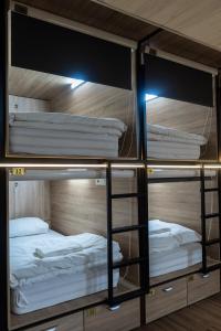 Łóżko lub łóżka w pokoju w obiekcie Hostel Inbox